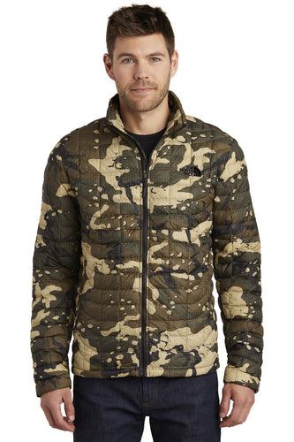 The North Face Burnt Olive Woodchip Camo Print NF0A3LH2 jackets with company logo